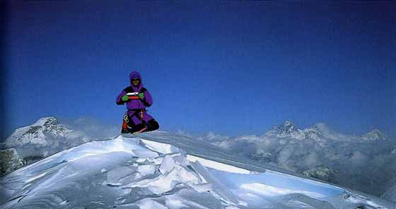 
Andrej Sremfelj on Menlungtse Main Summit on October 23, 1991 after First Ascent. Cho Oyu is on the left; Everest, Lhotse, Nuptse and Makalu are on the right.
